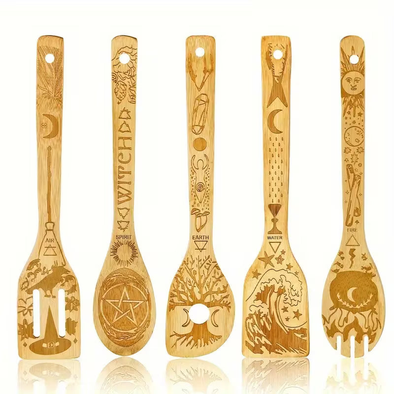 Set of five wooden spoons with engraved designs on a white background